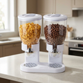 Double cereal dispenser with cornflakes and chocolate cereal in a modern kitchen